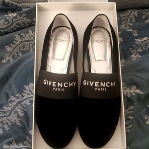 Givenchy women size 10B slipper black suede with Givenchy name across front.